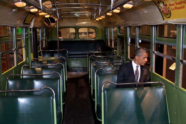 President Obama sits on the  Rosa Parks bus